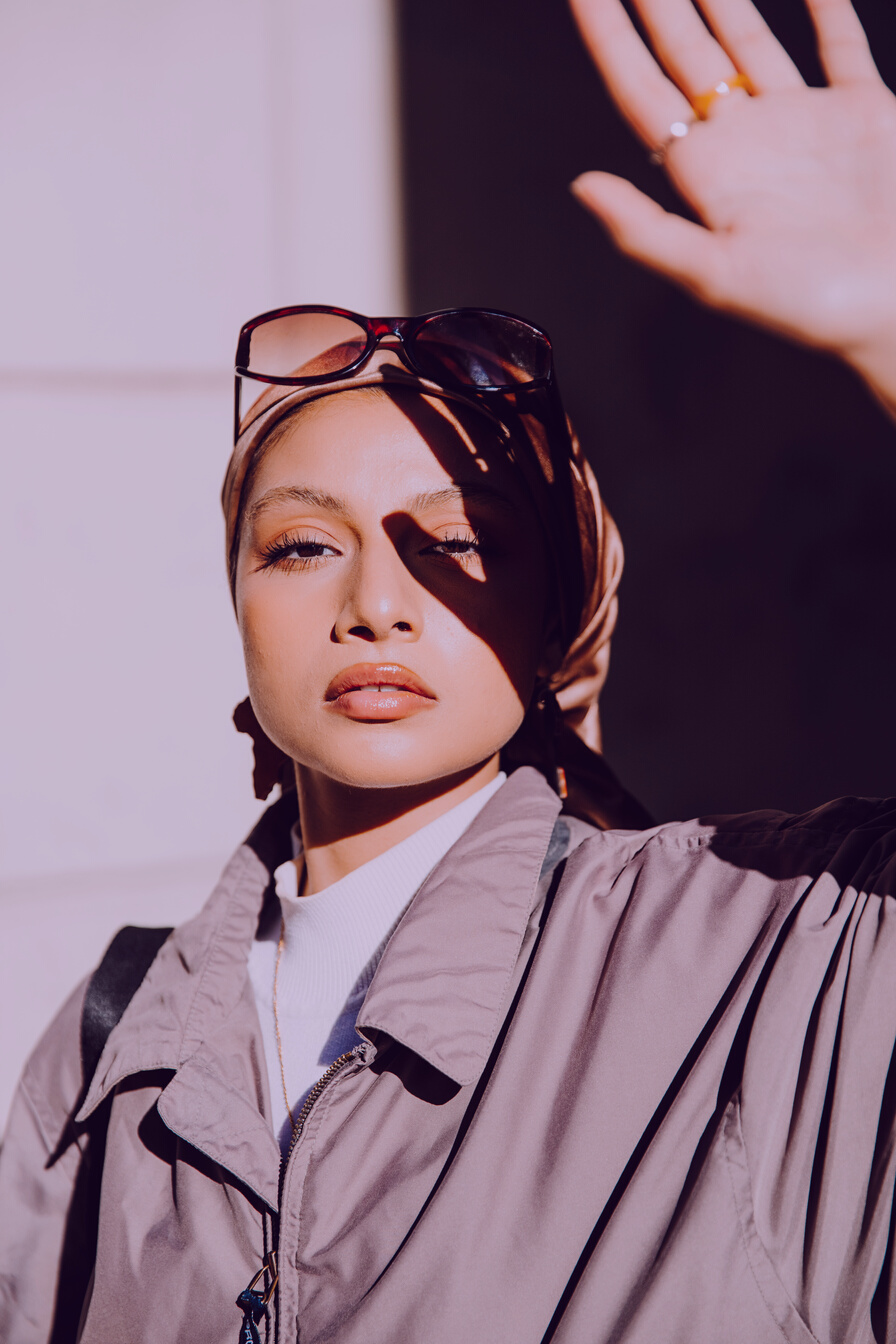 Portrait of Stylish Woman Wearing Hijab in the City